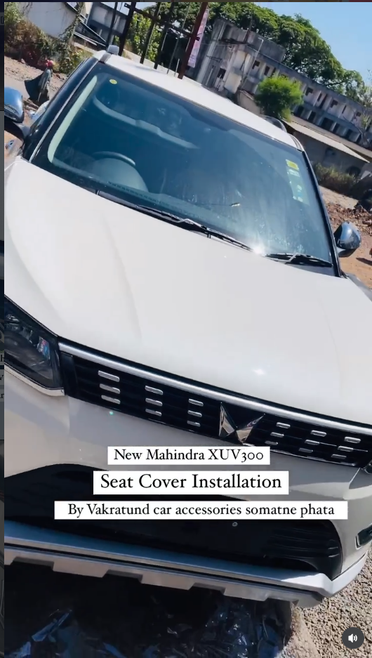 Seat cover fitting on a new Mahindra XUV300 — a real Vakratund job.